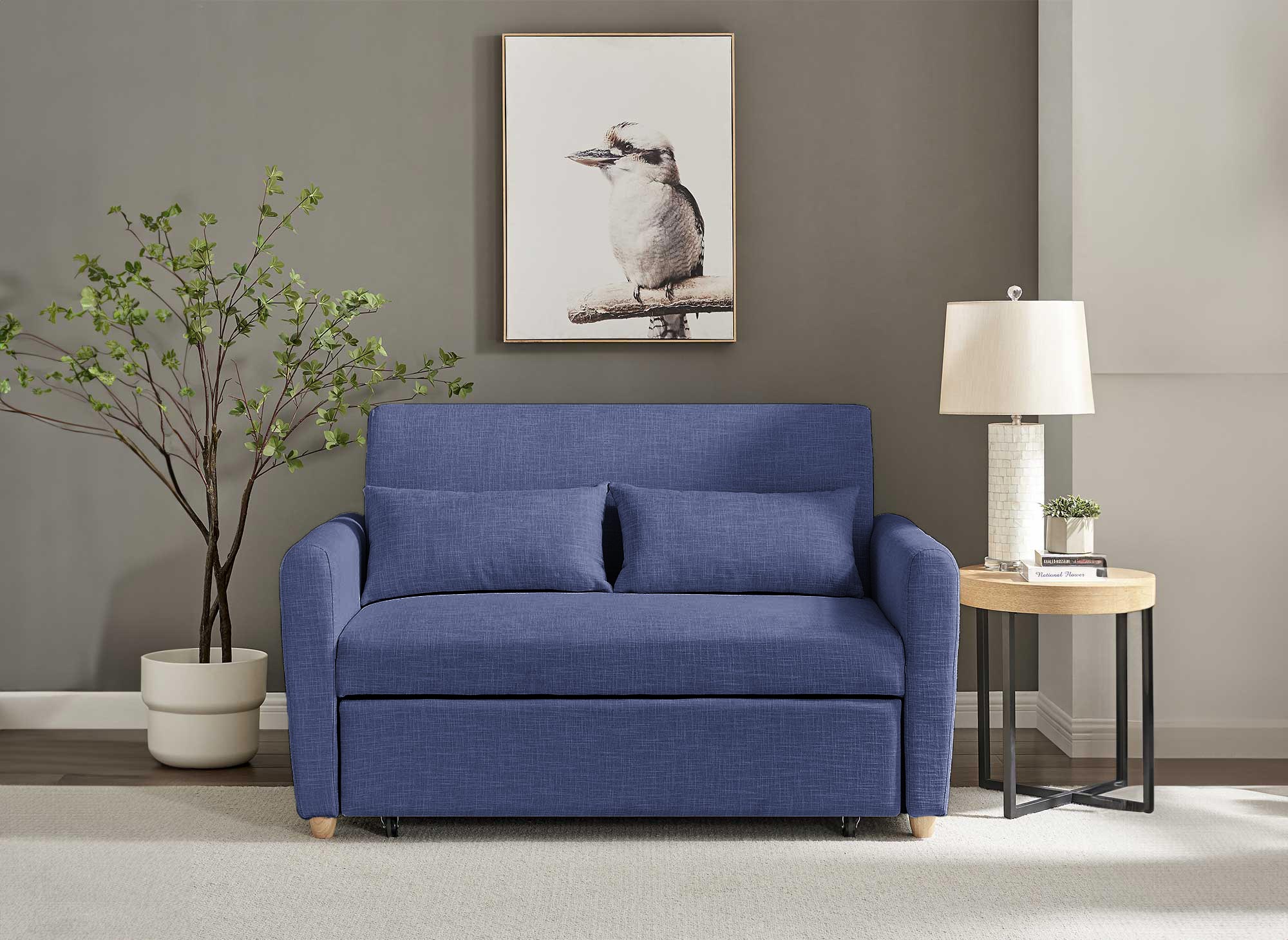 Canapé convertible scandinave en tissu bleu KALAYA