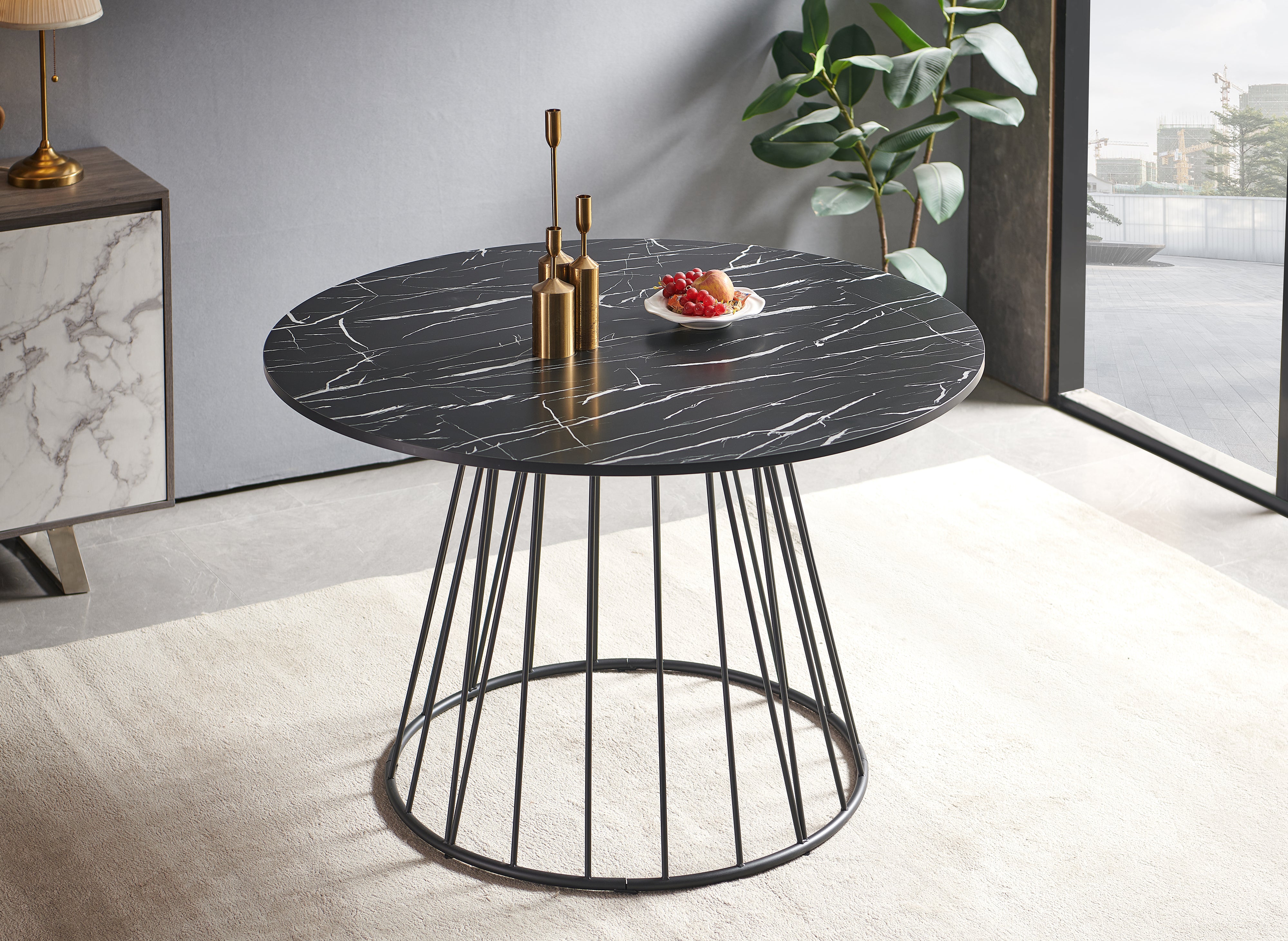 Table à manger ronde effet marbre noir pied en métal noir STELLA