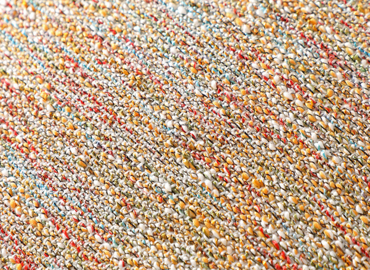 Coussin orange en tweed avec ponpons 45x45 cm POPINE - DécoInParis