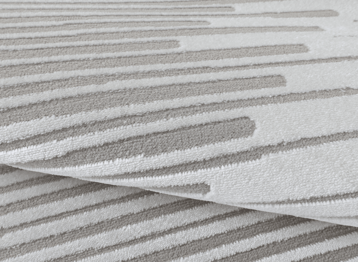 Tapis gris à lignes asymétriques 160 x 230 cm VENISE - DécoInParis