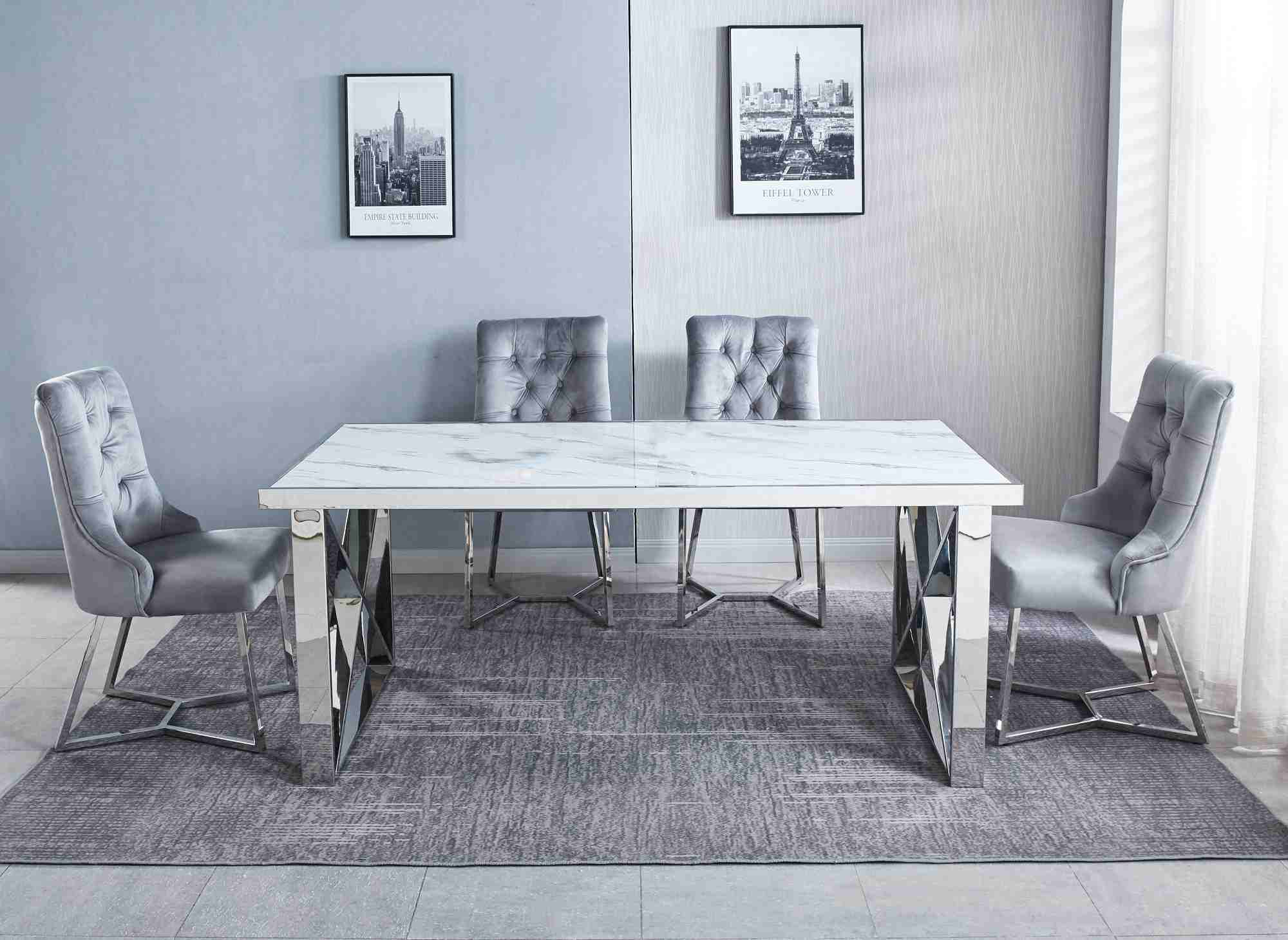 https://www.decoinparis.com/img/produit/48359-table-a-manger-rectangulaire-effet-marbre-blanc-et-pieds-argentes-isore.jpg